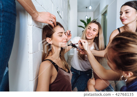 Young beauty girls doing make up 42768135