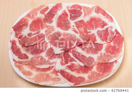 Raw red beef slice for Shabu and Sukiyaki Japanese Raw red beef slice for Shabu and Sukiyaki Japanese 42769441