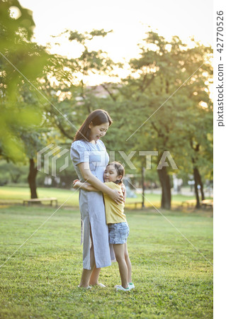 Mother and child, lawn, warmth Mother and child, lawn, warmth 42770526