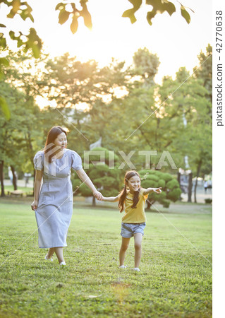 Mother and Child, Lawn, and Conversation Mother and Child, Lawn, and Conversation 42770638