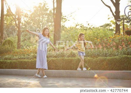 Mother and child, walking in the park Mother and child, walking in the park 42770744