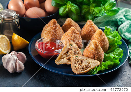 Coxinha. Fried croquette with chicken Coxinha. Fried croquette with chicken 42772970