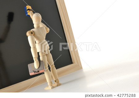 Teacher and blackboard 42775288