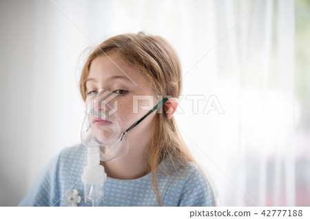 Girl is tired of having to stay in the hospital. Girl is tired of having to stay in the hospital. 42777188