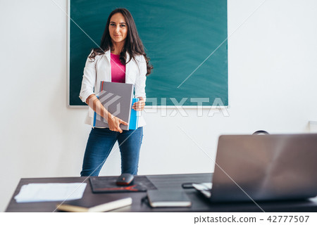 Female student smiling and looking at camera. 42777507