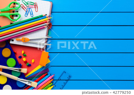 School supplies on blue wooden table 42779250