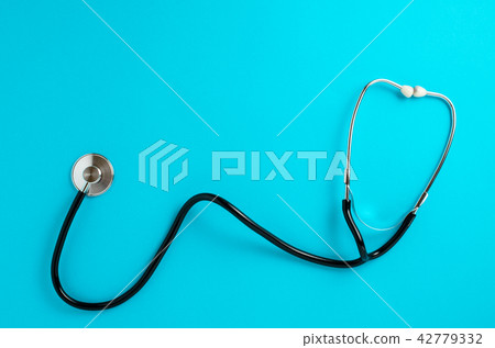 Stethoscope on blue background 42779332
