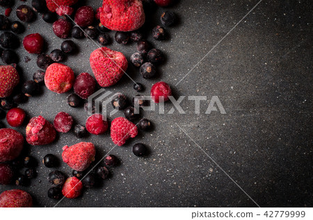 Frozen berries on dark background 42779999
