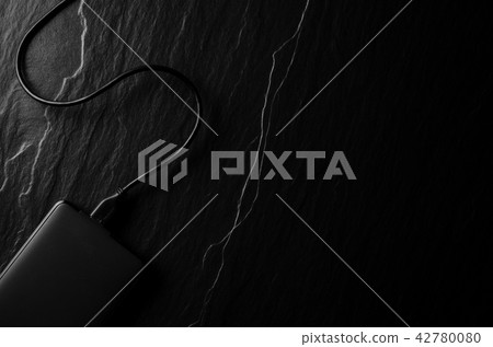 External hard drive on dark background External hard drive on dark background 42780080