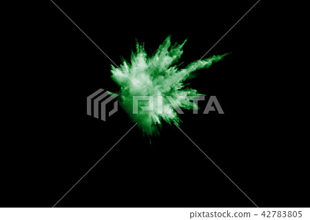 Green powder explosion on black background. Green powder explosion on black background. 42783805