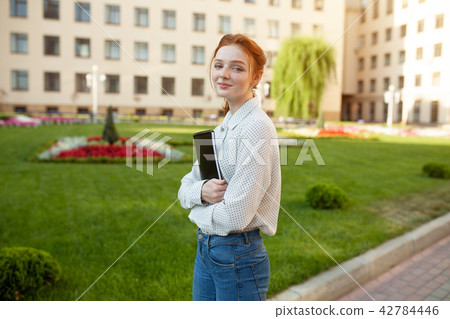 Beautiful red haired girl with freckles Beautiful red haired girl with freckles 42784446