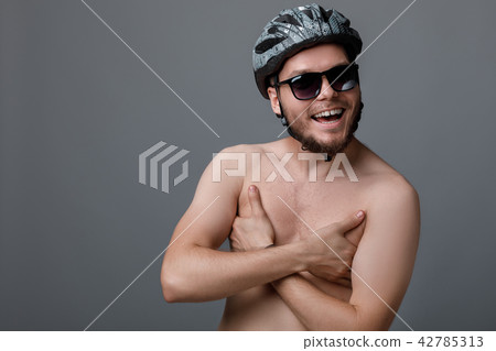 the funny portrait of the young cyclist 42785313