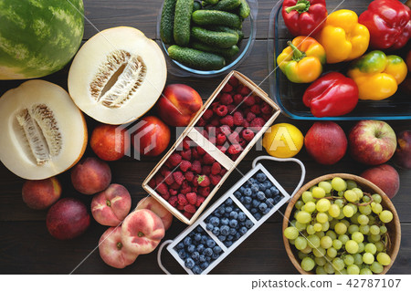 Fresh vegetables and fruits from market on the gray background. Summer and healthy life concept. Fresh vegetables and fruits from market on the gray background. Summer and healthy life concept. 42787107