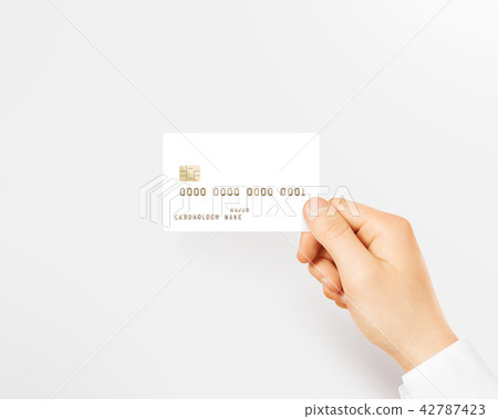Hand holding blank white credit card mockup isolated. 42787423