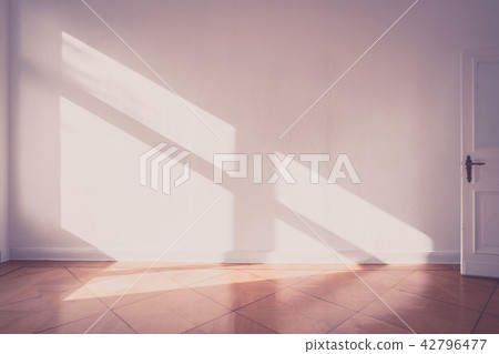 sunlight on apartment wall - empty room old photo sunlight on apartment wall - empty room old photo 42796477