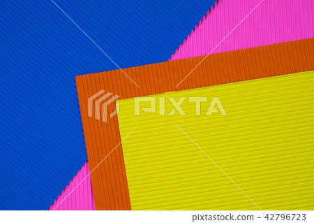 Multi coloured corrugated paper background 42796723