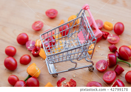cut yellow and red peppers with tomatoes cut yellow and red peppers with tomatoes 42799178