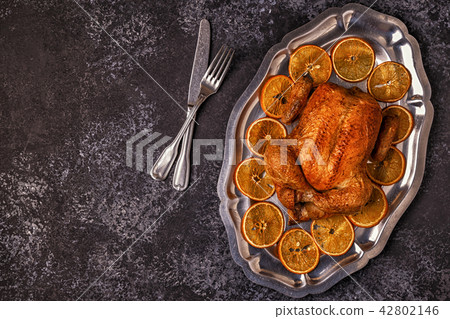 Roasted whole chicken with Christmas decoration. 42802146