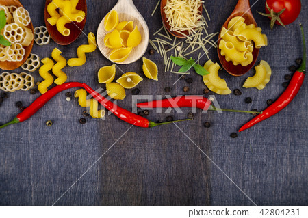 Different pasta in spoons Different pasta in spoons 42804231