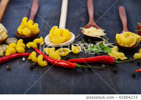Different pasta in spoons Different pasta in spoons 42804233