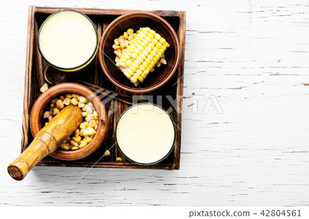 Cup of corn milk 42804561