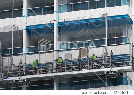 Tower apartment repair work Tower apartment repair work 42806711