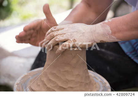 Ceramics wheel work 42809724