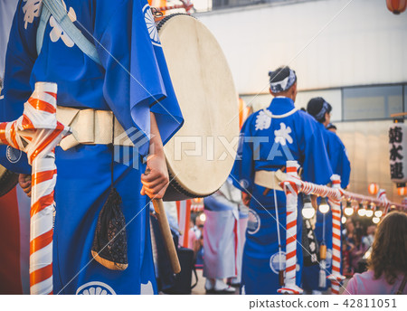 Drummer performance, Taiko Drums Japanese folklore. Japanese artists perform at Bon Festival in blue 42811051