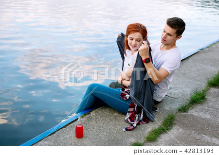 Nice young man holding a plaid Romantic date. 42813193