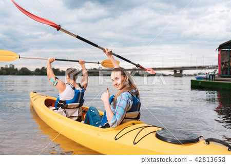 Beaming appealing woman feeling amazing after nice river ride 42813658