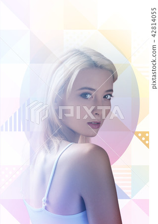 Young girl feeling satisfied with her beautiful hair after using a new shampoo 42814055