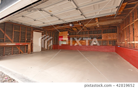 Garage doors open a garage wood support exposed 42819652