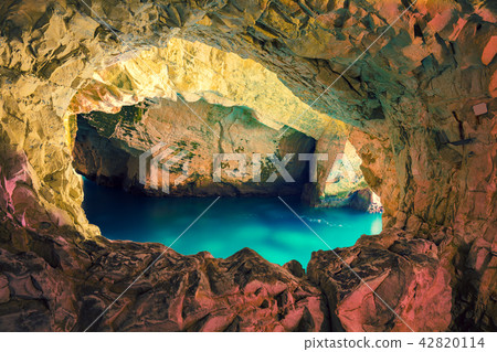 Natural grottoes in cave with calm sea Natural grottoes in cave with calm sea 42820114