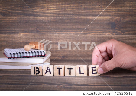 battle wooden letters on the office desk 42820512