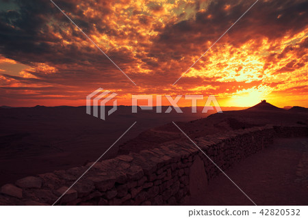 Beautiful dramatic sunset over desert Beautiful dramatic sunset over desert 42820532