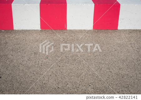 empty asphalt road / runway cement barrier 42822141