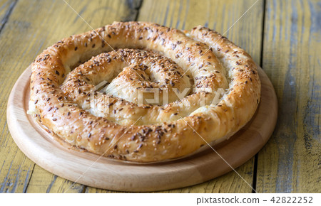 Spiral phyllo pie with feta Spiral phyllo pie with feta 42822252