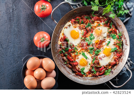 Shakshuka in a frying pan Shakshuka in a frying pan 42823524