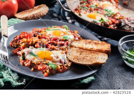 Portion of shakshuka on a plate Portion of shakshuka on a plate 42823528