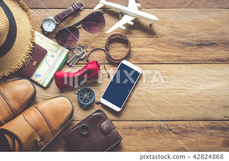 Travel accessories on wooden floor ready  travel 42824868