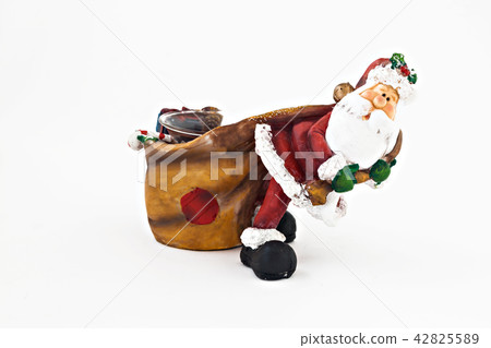 ceramic figurine of Santa Claus with a big sack 42825589