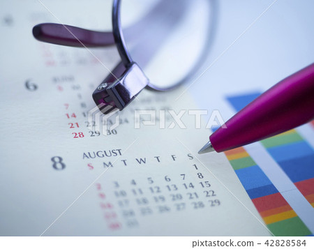 Business image · graph · calendar · glasses · female Business image · graph · calendar · glasses · female 42828584