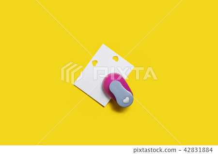 hole puncher with a paper 42831884