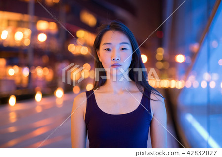 Portrait Of Beautiful Asian Woman Outdoors At Night Portrait Of Beautiful Asian Woman Outdoors At Night 42832027