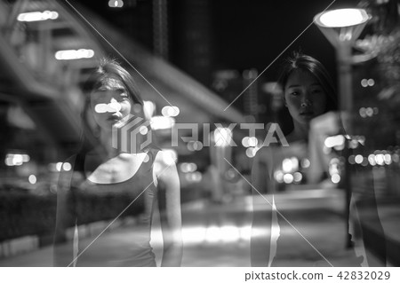 Black And White Double Exposure Portrait Of Asian Woman At Night Black And White Double Exposure Portrait Of Asian Woman At Night 42832029