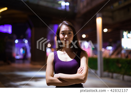 Portrait Of Beautiful Asian Woman Outdoors At Night Portrait Of Beautiful Asian Woman Outdoors At Night 42832137
