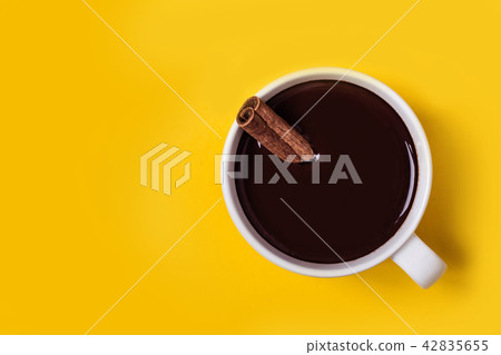 Hot chocolate cup with cinnamon. Warming winter. 42835655