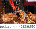 backhoe dig a ground for construction. 42839850