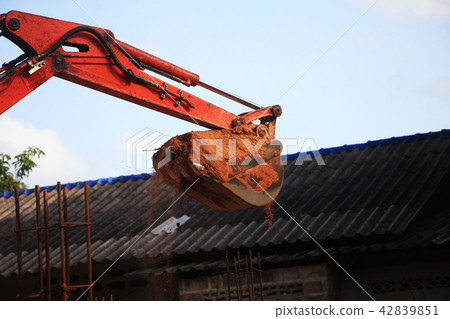 backhoe dig a ground for construction. backhoe dig a ground for construction. 42839851