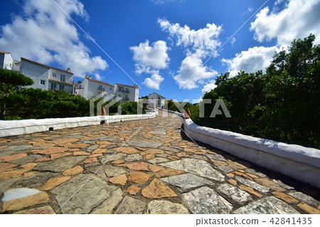 A slope of the Mediterranean village A slope of the Mediterranean village 42841435